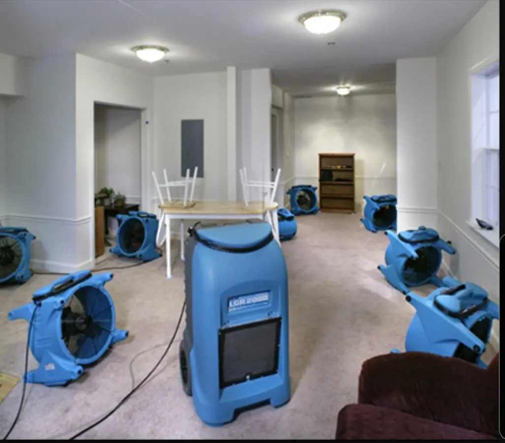 Air movers and dehumidifier setup for Water Damage Restoration in Heber